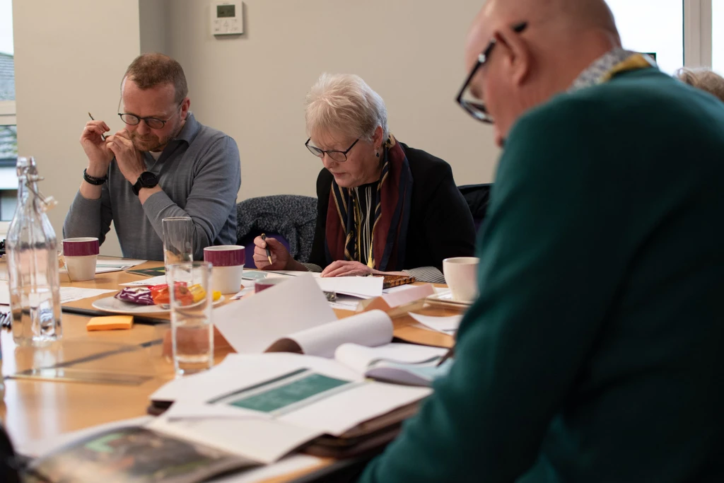 Customers at a meeting