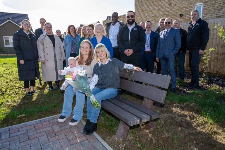 Steve Benson’s family and invited guests at the recent opening event of Woodlands View