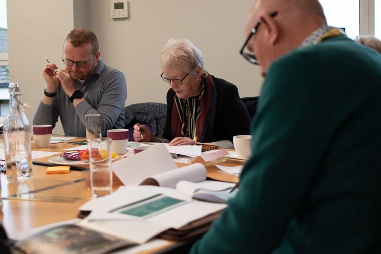 Customers at a meeting