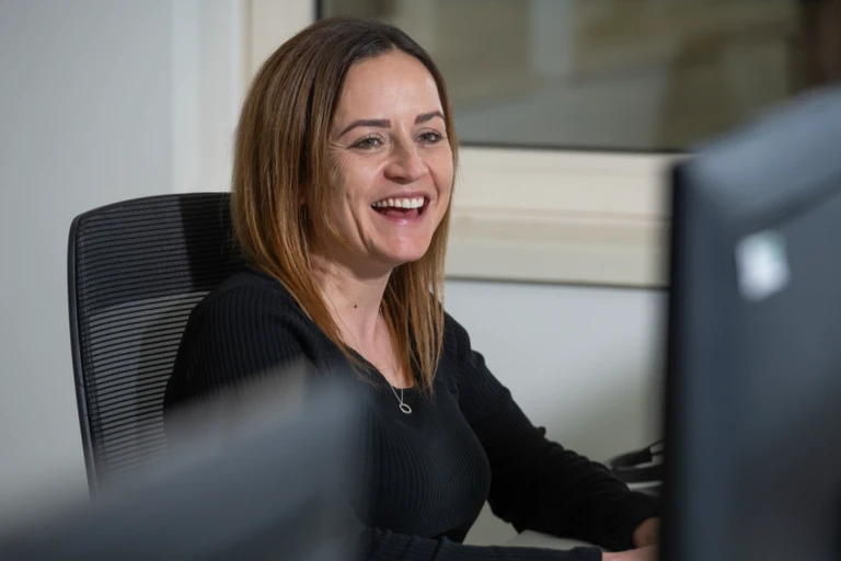 Susan, Head of Property Operations, at her desk