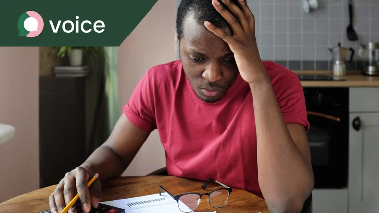 Voice Newletter – Man looking upset at finances