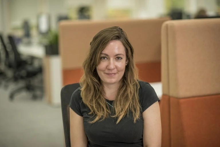 Debt Advisor Adelle, in the office