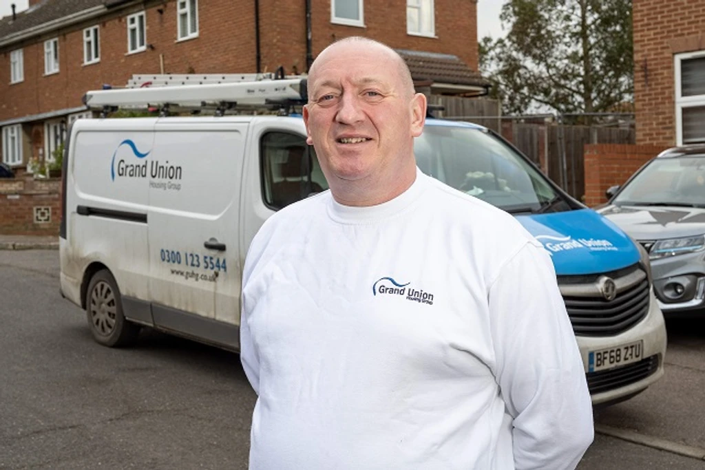 Stuart McNeil in front of his van
