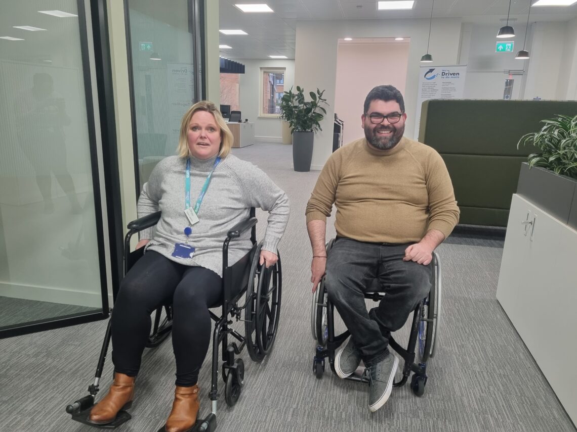 Ollie and Karen taking part in the wheelchair challenge